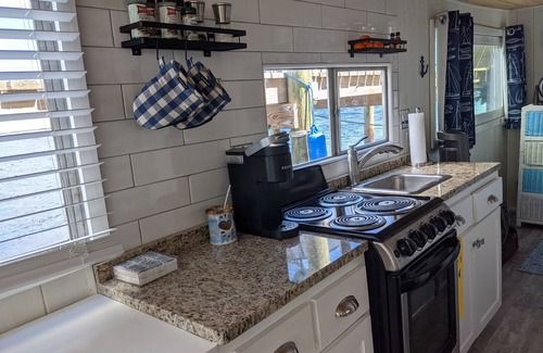 Carrabelle Boat Rental | Banana Boat! Moored at private dock on the Carrabelle River