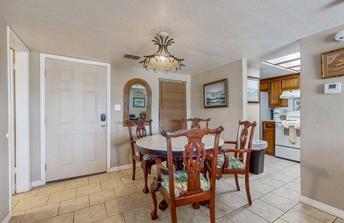 South Padre Island Condo | Bay-view all-suite condo with pool & fishing dock - walk to beach