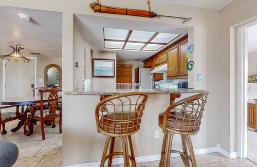 South Padre Island Condo | Bay-view all-suite condo with pool & fishing dock - walk to beach