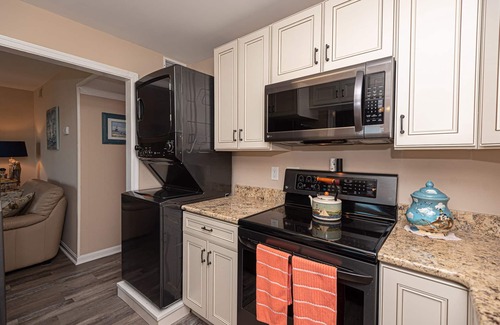Cedar Neck Condo | Bayfront 1st Floor Condo with Olympic Size Pool - Family Friendly & Renovated