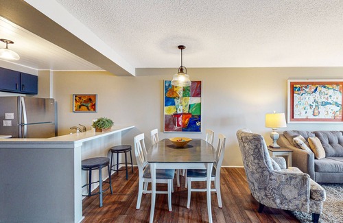 Maple City Condo | Bayfront condo with lake & bay views, deck, 2 fireplaces, private washer/dryer