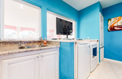 Port Isabel House | Bayfront home with dock, private elevator, central AC & grill -snowbird-friendly