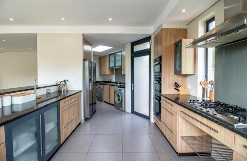 Sunset Beach House | Bayhill Terrace 17 by CTHA