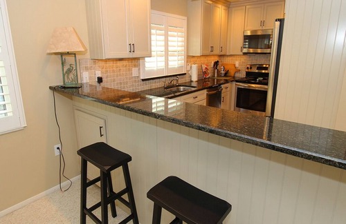 Whitney Beach Condo | Bayside 2BR on Whitney Beach w Canal Views, Pool, and Private Lanai by RVA