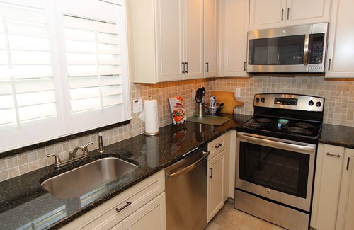 Whitney Beach Condo | Bayside 2BR on Whitney Beach w Canal Views, Pool, and Private Lanai by RVA