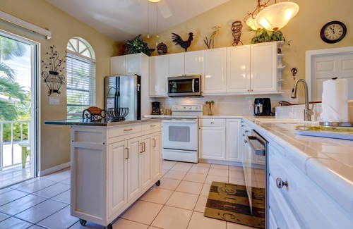 Sugarloaf Shores House | Bayside Beauty: Tropical Paradise 3BR Home, Panoramic Open Water Views, Grotto Pool, Dog-Friendly