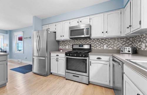 Suttons Bay House | Bayside Serenity with Hot Tub! Dog Friendly!