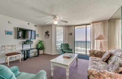 Atlantic Beach Apartment | Beach Club 6F - Oceanfront condo with a recliner and outdoor pool