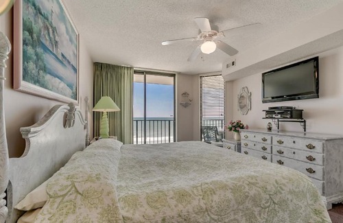 Atlantic Beach Apartment | Beach Club 6F - Oceanfront condo with a recliner and outdoor pool