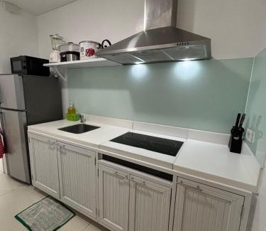 Nasugbu Apartment | Beach condos at Pico de Loro Cove - Wi-Fi & Netflix, 42-50'TVs with Cignal cable, Uratex beds & pillows, equipped kitchen, balcony, parking - guest registration fee is not included