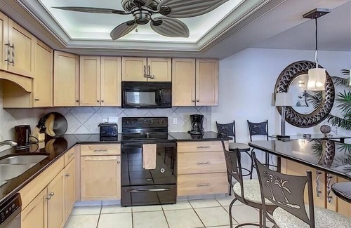 South Island Condo | Beach front condo with gulf views, close to shops & dining!
