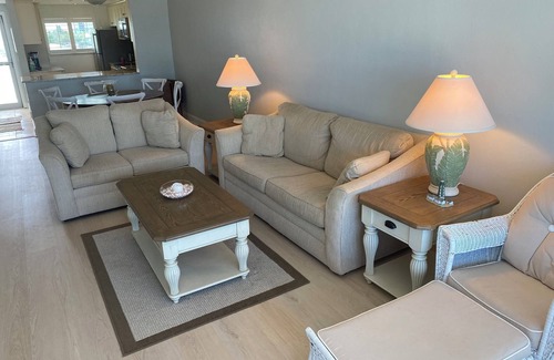 South Island Condo | Beach front paradise! Steps to the beach with unforgettable sunsets.