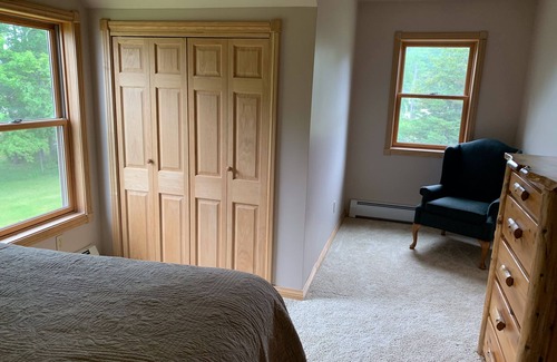 Garden Cottage | Beach House log cabin with 240’ of sand beach on Lake Michigan. Amazing sunsets