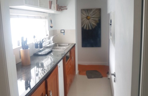 Gordons Bay Central Apartment | Beach on Antilles - Sandy Toes and Relaxation just steps away from your room