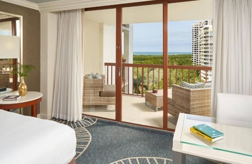 Pelican Bay Resort | Beach Resort Stay Perfect for Romantic Getaways | Scenic Sunset at Your Room