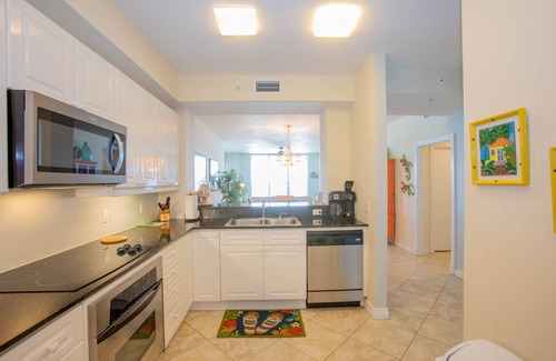 Navarre Beach Condo | BEACH SETUP Mar. thru Oct. June and July, Sat to Sat only. Sleeps 6 in beds.