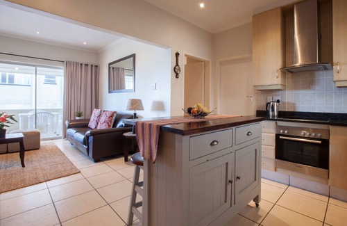 Three Anchor Bay Apartment | Beachfront Flat. Balcony, Parking & Free Wifi