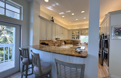 North Captiva House | BEACHFRONT, HEATED POOL, KAYAKS/SUP, LANAI W/GULF VIEWS, 85' DOCK, 2 GOLF CARTS