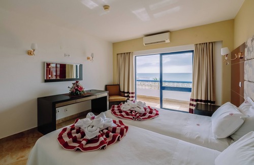 Oura Hotel | Beachfront Hotel with Indoor & Outdoor Pool! 2 Homely Units with Full Kitchens!