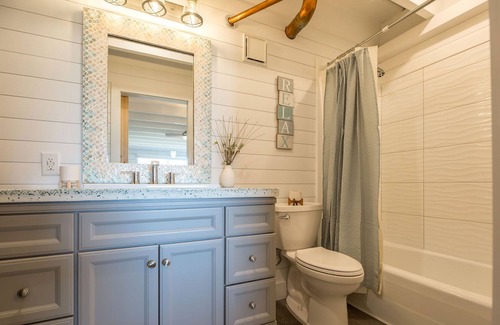 Bid-a-wee Beach Condo | Beachfront, Renovated, Sleeps 4, Free Beach Chairs, WiFi and coffee!