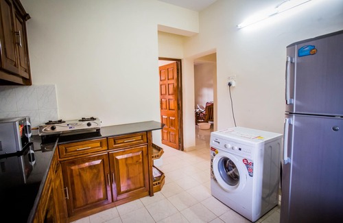Candolim Apartment | Beachside Beauty in Regal Park, Candolim, Goa with Pool and Garden Views