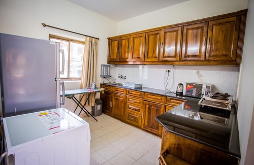 Candolim Apartment | Beachside Beauty in Regal Park, Candolim, Goa with Pool and Garden Views