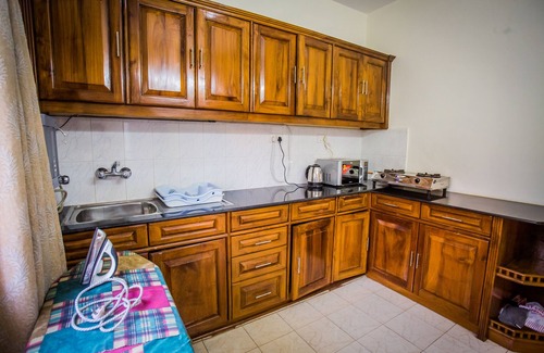 Candolim Apartment | Beachside Beauty in Regal Park, Candolim, Goa with Pool and Garden Views