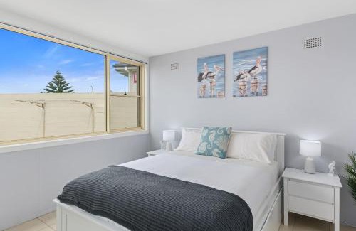 Towradgi Apartment | 'Beachside Escape' A Breezy Waterfront Family Abode