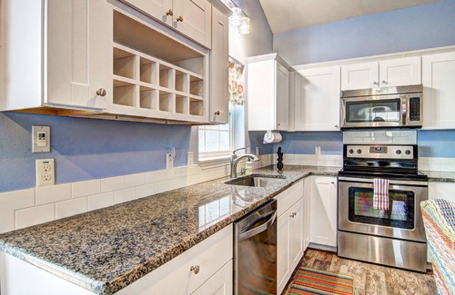North Beach House | Beachside home with huge deck just steps from the sand - minutes to city
