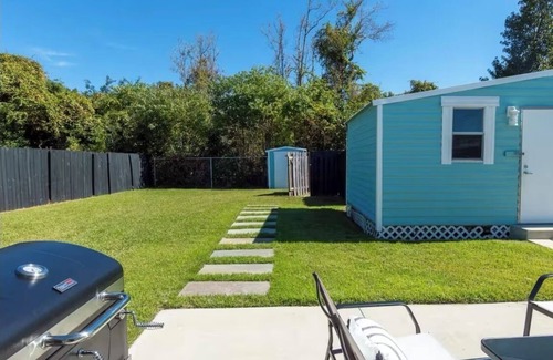 Highland City Apartment | Beachy Poolside Palm nestled between PCB, Mexico Beach and downtown PC.