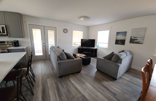 Grand-Digue House | Beausoleil Saltwater Sunsets RnR on Acadian Coast with WiFi, Hot Tub, Air Hockey