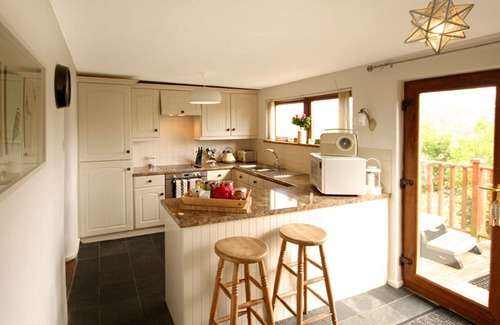 Cemaes Bay Cottage | Beautiful 19th Century Seaside Cottage with hot tub and river views