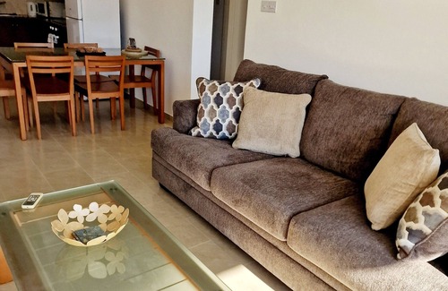 Peyia Town Apartment | Beautiful 2 bedroom apartment located pool level, sea view, FREE WIFI