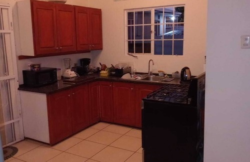 Woodbrook House | Beautiful 4 bedroom home & additional 2 bedroom detached guess house.