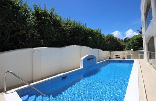 Atlantic Shores Villa | Beautiful, airy 3 bedroom second-floor unit with views of the ocean and pool.