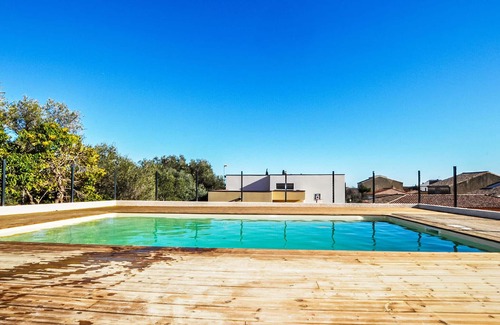 La Palme House | Beautiful and modern vacation home with communal pool and sea view from the terrace.
