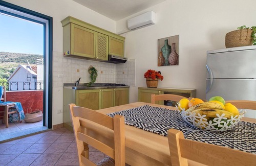 Trinita d'Agultu Apartment | Beautiful apartment for 6 people with A/C, pool, WIFI, TV, patio and parking