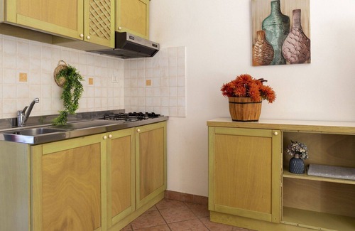Trinita d'Agultu Apartment | Beautiful apartment for 6 people with A/C, pool, WIFI, TV, patio and parking