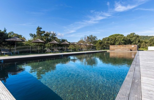 Santa Giulia Apartment | Beautiful apartment for 4 people with WIFI, A/C, pool, TV and patio