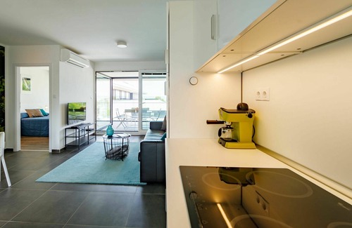 Balatonszemes Apartment | Beautiful apartment for 6 guests with A/C, WIFI, pool, TV, terrace, pets allowed and parking