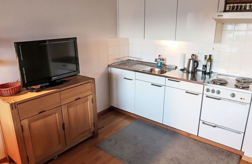 Laax Apartment | Beautiful apartment for 3 people with pool, WIFI, TV, balcony, pets allowed and panoramic view