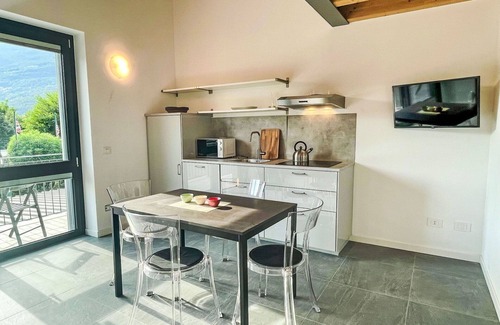 Dervio Apartment | Beautiful apartment for 4 people with pool, A/C, WIFI, TV, patio and panoramic view