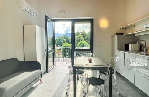 Dervio Apartment | Beautiful apartment for 4 people with pool, A/C, WIFI, TV, patio and panoramic view