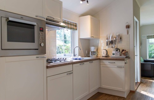 Municipality of Dalfsen House | Beautiful apartment in villa for 4 guests with pool, WIFI, TV and terrace