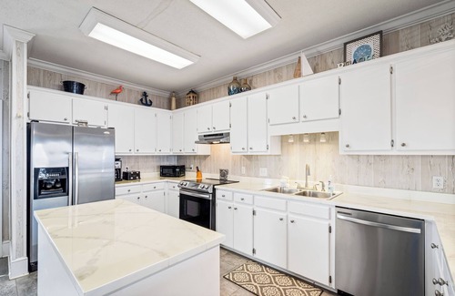 Silver Cay House | Beautiful bayfront home with views of the Dauphin Island Bridge
