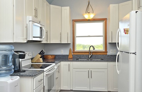 Carova Beach House | Beautiful beach home where wild horses roam free, pool,hot tub,dog friendly