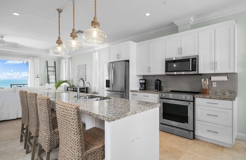 Nassau House | Beautiful Beachfront 4-bedroom Townhome