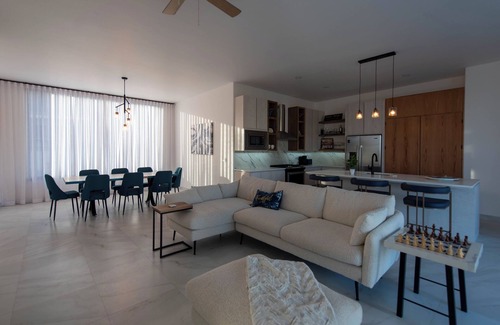 Cabo Bello House | Beautiful brand-new home with amazing blue water and lush foliage views.