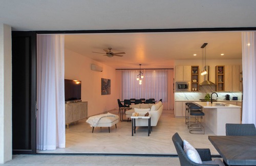 Cabo Bello House | Beautiful brand-new home with amazing blue water and lush foliage views.