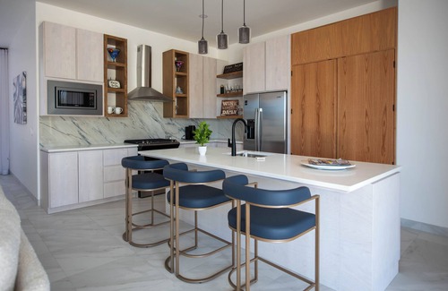 Cabo Bello House | Beautiful brand-new home with amazing blue water and lush foliage views.